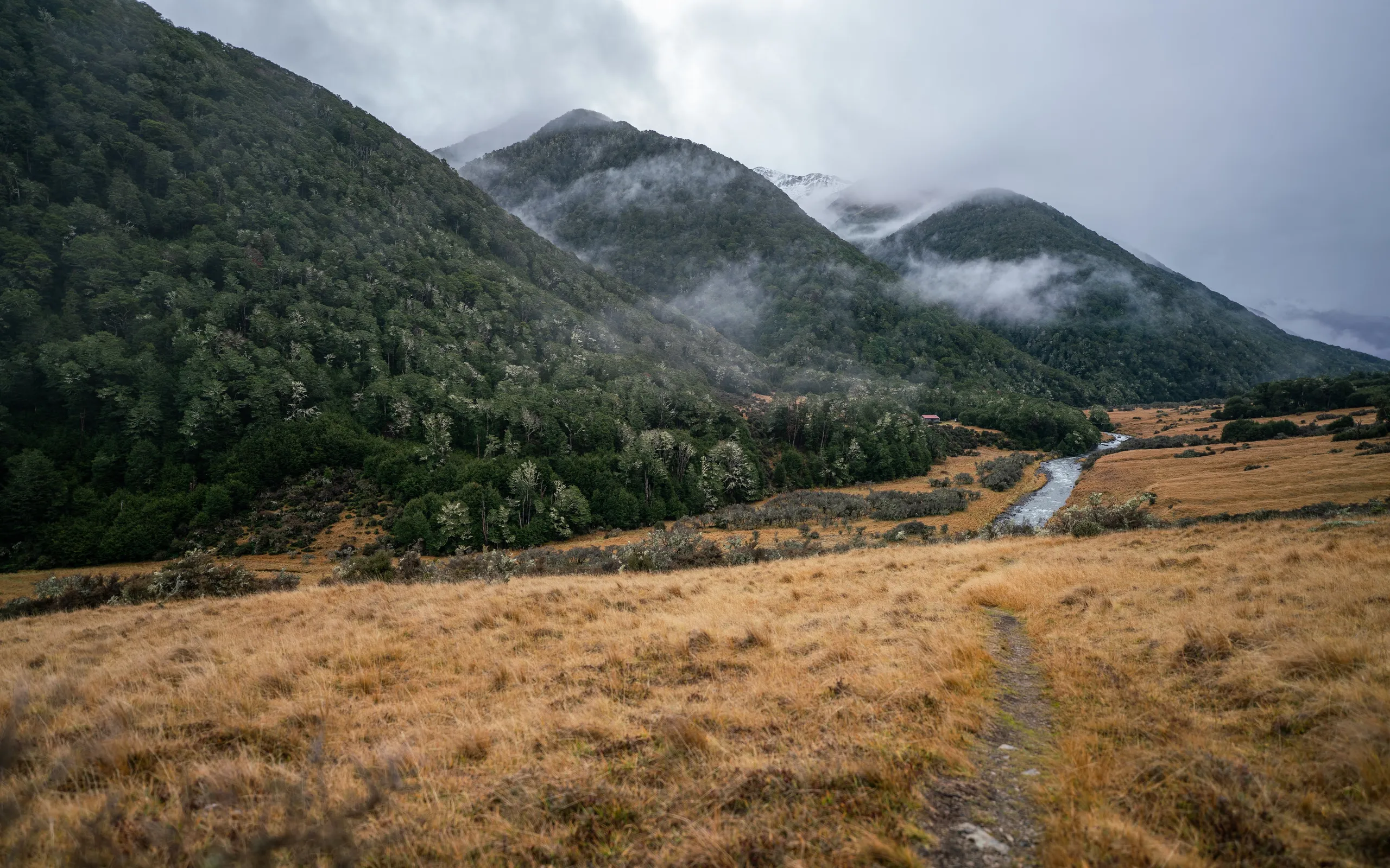 Valley views while approaching Boyle Flat Hut. The hut can be seen in the distance on the other side of the river.